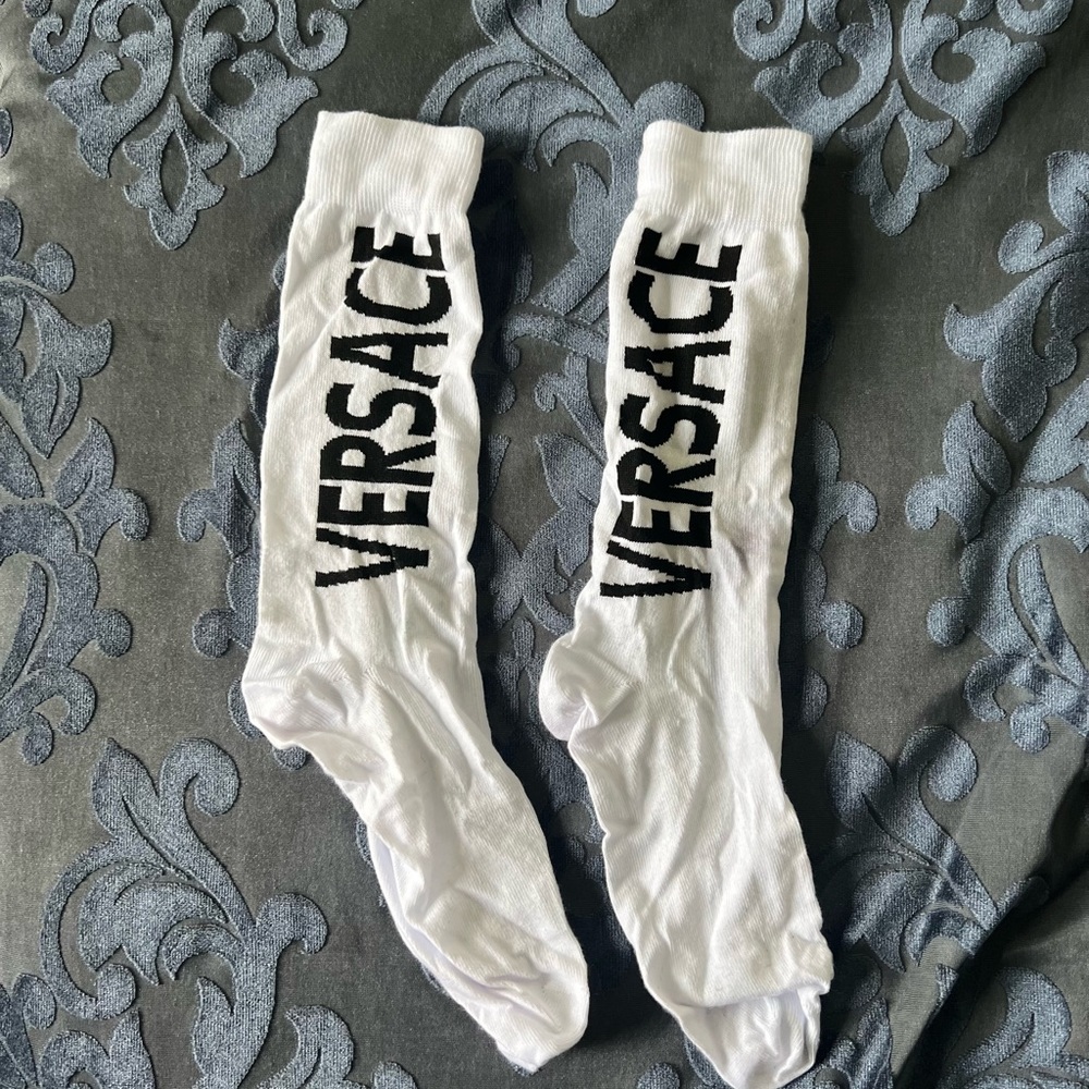 Versace socks worn once, for an hour.